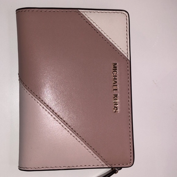 Michael Kors backpack and wallets